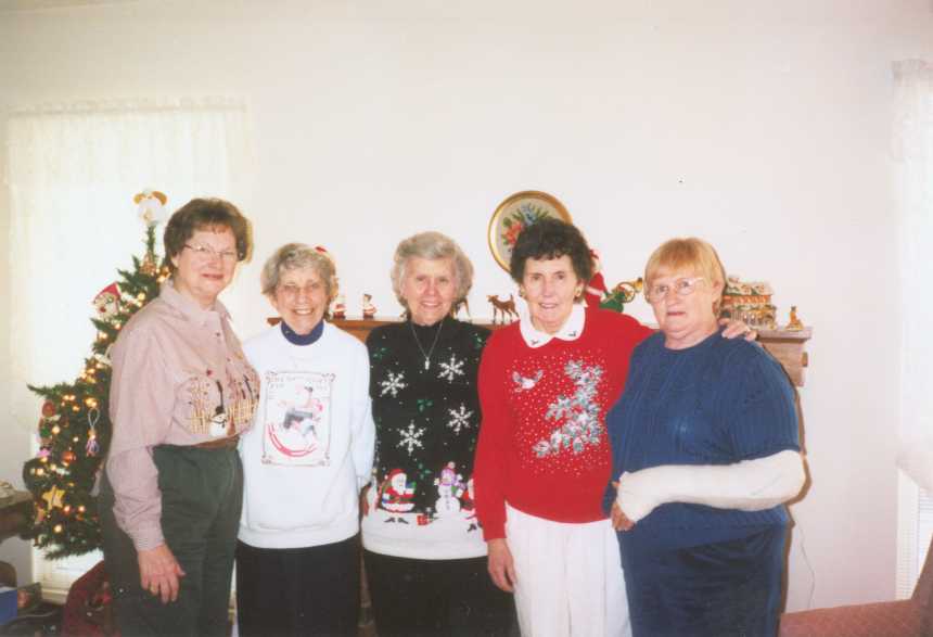 Mary (on the right) and her friends in December 2002 have been meeting every month since before 1995